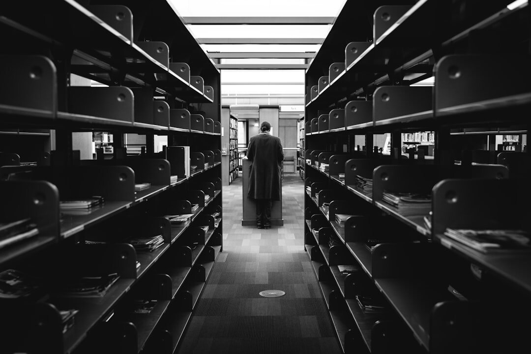 Shelves filled with archived videotapes and film reels