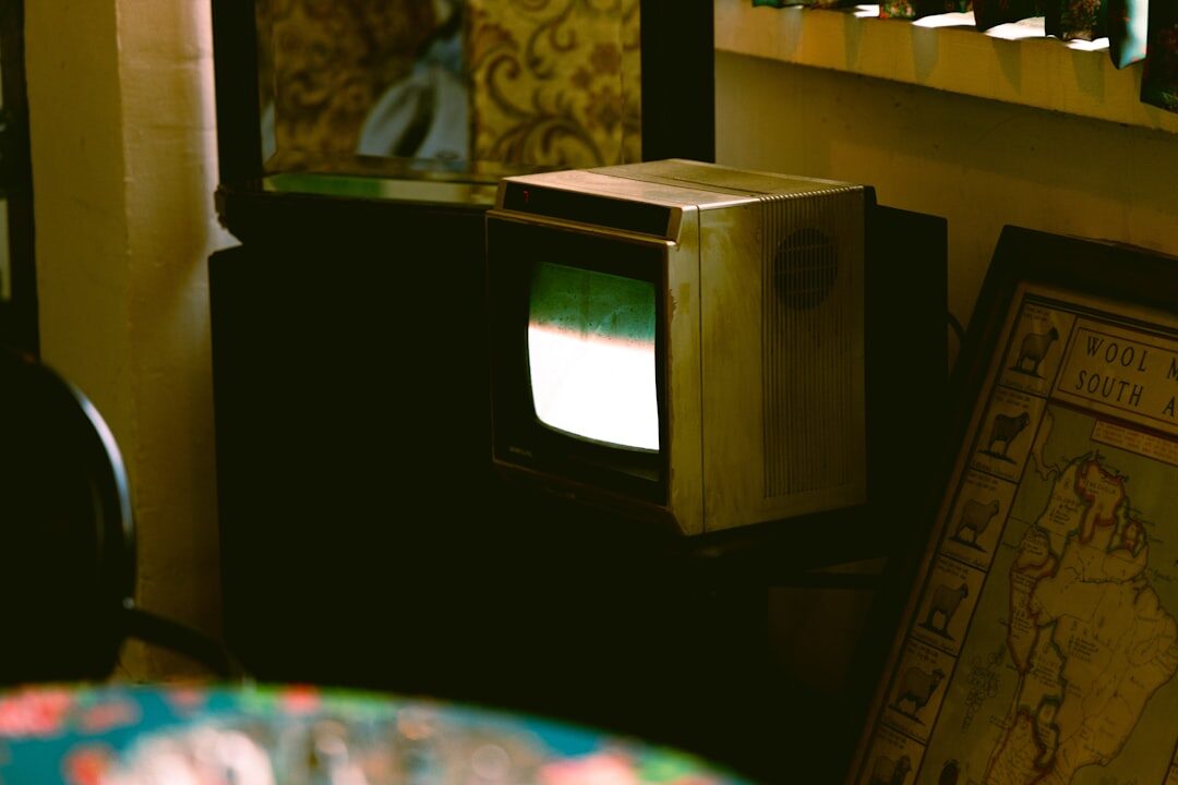 person watching old tv